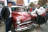 Banner photo of a lady in 1950's costume alongside a Chevy classic car at the Hinckley BID Motorshow